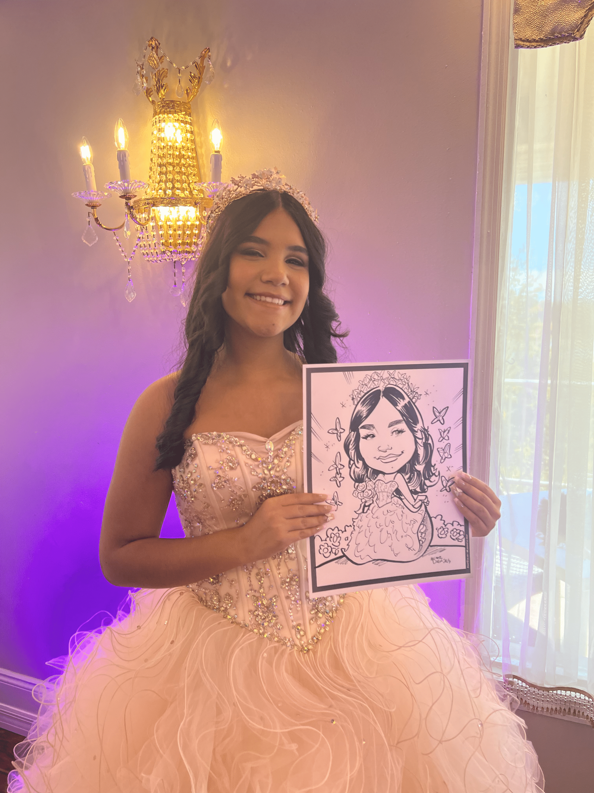 Girl at her quinceanera holding a custom caricature