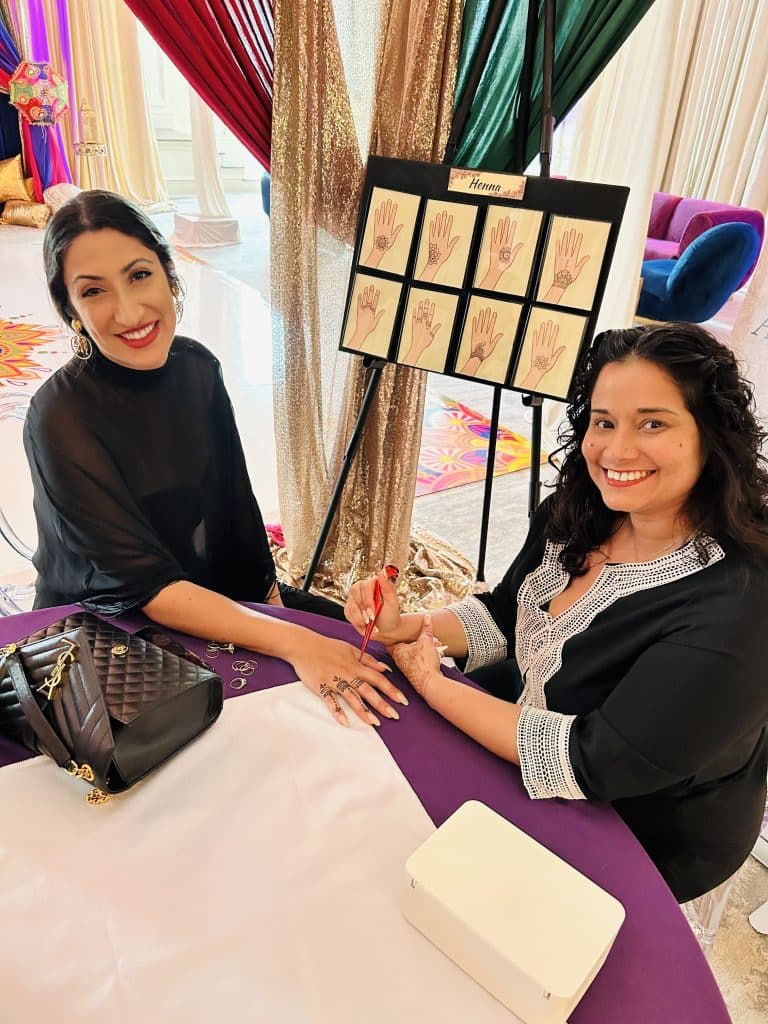 Henna artist and guest
