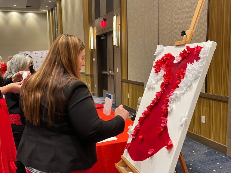 Woman making tissue paper art