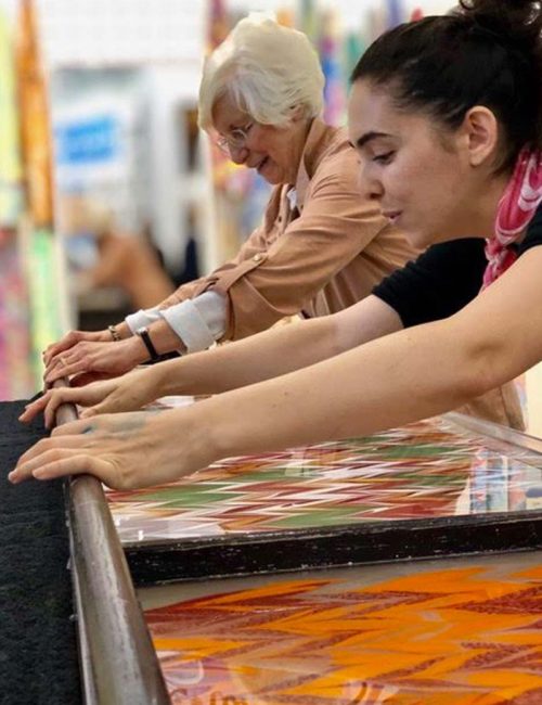 People doing artistic marbling
